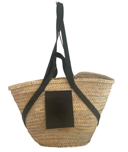 Handmade and woven bag in palm leaves with handles and shoulder strap in black leather