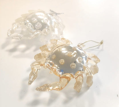 Boules de Noël - Pack de 2 Crabes de Noël 1 or et 1 nacre, décorés de perles et de paillettes (10x10x3 cm)